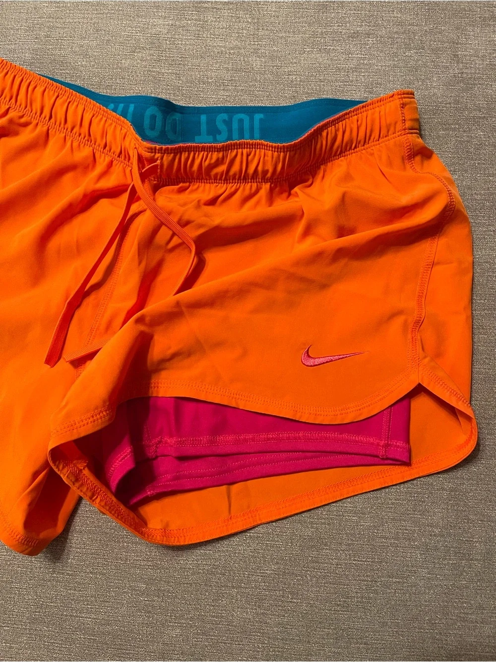 Nike Dri-FIT Women's Bright Orange Running Athletic Shorts with Pink Swoosh